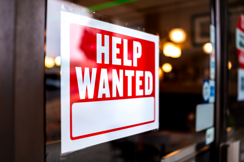 help-wanted-sign-on-store-window-vf-e163